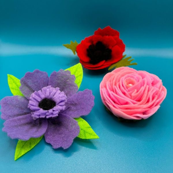 Purple, red and pink flower brooches